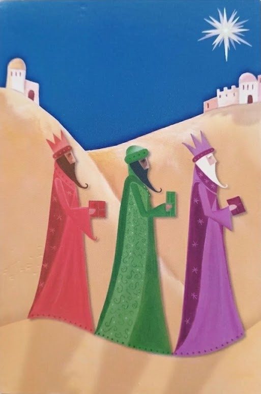 Christmas card: the Three Kings walking toward the star